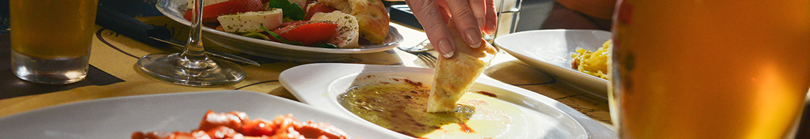 Eating Greek at Uncle Gussy's restaurant in New York, NY.
